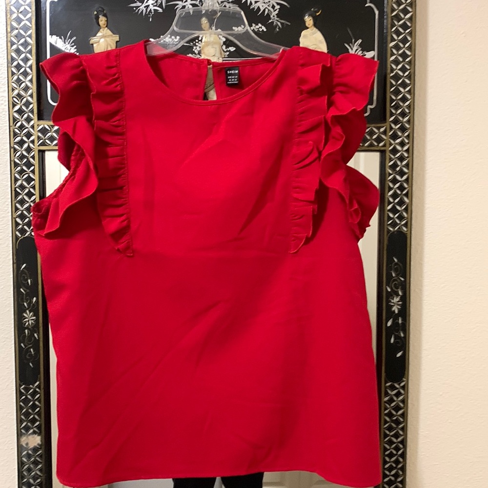 Women’s red flutter sleeve blouse